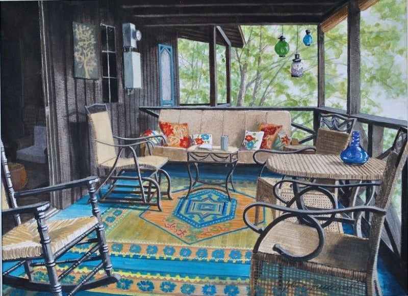Idle Time-Oral Lake, WV- Limited Edition Giclee Print. Can Contemporary Realism be Rustic? Why not? From the original watercolor painting by Lotus MacDowell, Artworks WV, of the front porch of a cabin captures the cozy feeling that comes from being in the woods. From the rocking chair in the foreground to the colorful rugs and woven furniture, this outdoor hideaway looks like the perfect place to kick back